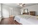 Bedroom featuring hardwood floors and access to an ensuite bathroom at 520 Edgemore Rd, Canton, GA 30114