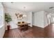 Dining room with wooden table and bench seating, plus a decorative world map on the wall at 520 Edgemore Rd, Canton, GA 30114