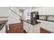 Modern kitchen with white cabinets, dark countertops, stainless steel appliances, and a center island at 520 Edgemore Rd, Canton, GA 30114