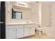 Bathroom with a large vanity, toilet, and a shower-tub combo at 6895 Slate Stone Se Way # 3, Mableton, GA 30126