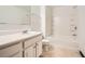 Bright bathroom with vanity, toilet, and shower-tub combo at 6895 Slate Stone Se Way # 3, Mableton, GA 30126