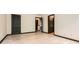 Spacious bedroom with hardwood floors and multiple doors at 6895 Slate Stone Se Way # 3, Mableton, GA 30126