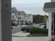 Street view of a group of townhomes with similar architectural features, like shuttered windows at 6895 Slate Stone Se Way # 3, Mableton, GA 30126