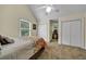 Cozy bedroom with plush carpeting and closet at 7212 Avalon Dr, Douglasville, GA 30135