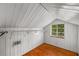Small attic space with painted wood and a storage shelf at 1981 N Decatur Ne Rd, Atlanta, GA 30307