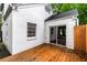 A cozy outdoor deck area, accessible from a sliding glass door, perfect for relaxation and entertaining at 1981 N Decatur Ne Rd, Atlanta, GA 30307