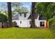 A spacious backyard is framed by mature trees, perfect for outdoor activities and gatherings at 1981 N Decatur Ne Rd, Atlanta, GA 30307