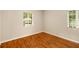 Bedroom features hardwood floors, neutral paint, and bright, natural light at 1981 N Decatur Ne Rd, Atlanta, GA 30307