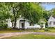 Charming one-story home with a manicured front yard and mature trees providing shade and curb appeal at 1981 N Decatur Ne Rd, Atlanta, GA 30307