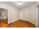 Living room featuring hardwood floors, overhead lighting, and neutral walls at 1981 N Decatur Ne Rd, Atlanta, GA 30307