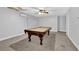 Finished basement featuring a pool table and ceiling fan at 4591 Millstone Walk Ne Dr, Buford, GA 30519