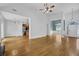 Open floor plan with dining and entry. Hardwood floors and lots of natural light at 4591 Millstone Walk Ne Dr, Buford, GA 30519