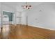 Spacious living area featuring hardwood flooring and neutral paint at 4591 Millstone Walk Ne Dr, Buford, GA 30519