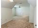 A large, versatile bonus room with plush carpet and ample space for recreation, relaxation, or a home office at 5123 Upper Elm St, Atlanta, GA 30349