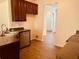 Functional kitchen with ample counter space, modern appliances, hardwood floors, and a convenient dishwasher at 5123 Upper Elm St, Atlanta, GA 30349