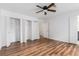 Spacious bedroom with hardwood floors, closet and neutral paint at 6 Stratford Hall Ne Pl, Atlanta, GA 30342