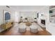 Bright living room featuring hardwood floors, fireplace, and stylish neutral decor at 6 Stratford Hall Ne Pl, Atlanta, GA 30342