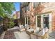 Private outdoor patio with comfortable seating, perfect for relaxation at 6 Stratford Hall Ne Pl, Atlanta, GA 30342