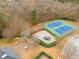 Enjoy the community's tennis courts and playground at 895 Roxfield Ct, Buford, GA 30518