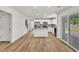 Open kitchen and dining area with stainless steel appliances and an island at 895 Roxfield Ct, Buford, GA 30518