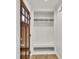 Convenient mudroom area with built-in storage and shelving for organization at 895 Roxfield Ct, Buford, GA 30518
