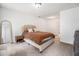 Relaxing main bedroom with neutral tones, a plush bed, and ample closet space at 1828 Brandy Woods Se Dr, Conyers, GA 30013