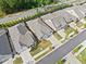 An aerial view of the neighborhood highlighting the well-planned street layout and manicured lawns at 209 Floral Valley Dr, Woodstock, GA 30188