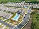 Aerial view of the community pool and amenities in a well-maintained neighborhood at 209 Floral Valley Dr, Woodstock, GA 30188
