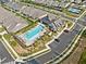 Aerial view of the community pool and amenities, showcasing a vibrant neighborhood setting at 209 Floral Valley Dr, Woodstock, GA 30188