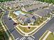 Aerial view of the community pool and clubhouse in a desirable residential area at 209 Floral Valley Dr, Woodstock, GA 30188