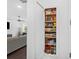 Walk in pantry includes shelving, storage and spice racks at 209 Floral Valley Dr, Woodstock, GA 30188
