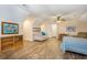 Large bonus room with wood floors, a ceiling fan, and plenty of space at 324 Kibbee Rd, Mcdonough, GA 30252