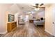 Large bonus room with wood floors, a ceiling fan, and plenty of space at 324 Kibbee Rd, Mcdonough, GA 30252