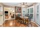 Breakfast nook with hardwood floors, bright natural light, and table with four chairs at 324 Kibbee Rd, Mcdonough, GA 30252
