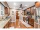 Updated kitchen features stainless steel appliances, granite countertops, and hardwood floors at 324 Kibbee Rd, Mcdonough, GA 30252