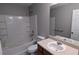 Bathroom features a vanity with a sink, bathtub, and toilet at 4373 Abram Dr, Conley, GA 30288
