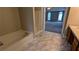 Bathroom with tile flooring and a separate shower and tub at 4373 Abram Dr, Conley, GA 30288