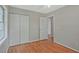 Bedroom featuring hardwood floors, neutral paint, and closet at 622 Sheffield Rd, Norcross, GA 30071
