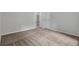 Bedroom showcasing neutral carpet and a closet at 10073 Dorothy Ct, Jonesboro, GA 30236