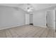 Spacious bedroom featuring tile floors, neutral walls, and a ceiling fan for added comfort at 10073 Dorothy Ct, Jonesboro, GA 30236