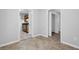 Hallway with tile flooring and multiple doors leading to different rooms at 10073 Dorothy Ct, Jonesboro, GA 30236