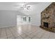 Living room featuring tile floors and a stone fireplace at 10073 Dorothy Ct, Jonesboro, GA 30236