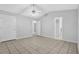 Large main bedroom with tile floors and an ensuite bathroom, providing ample space at 10073 Dorothy Ct, Jonesboro, GA 30236