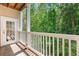 Inviting balcony provides serene views of lush green trees at 2400 Cumberland Se Pkwy # 613, Atlanta, GA 30339