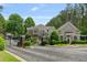 Gated community entrance with manicured landscaping and access to the community pool and amenities at 2400 Cumberland Se Pkwy # 613, Atlanta, GA 30339