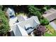 Aerial view of the property showcasing the house, detached garage, and the surrounding landscape at 2756 Octavia Ln, Marietta, GA 30062