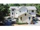 Beautiful backyard with a stone patio, outdoor dining area, lush landscaping, and mature trees for privacy at 2756 Octavia Ln, Marietta, GA 30062