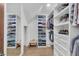 Walk-in closet with custom shelving and drawers, providing ample storage space for clothing and accessories at 2756 Octavia Ln, Marietta, GA 30062