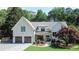 Stunning two-story modern farmhouse with a two-car garage and beautifully landscaped front yard at 2756 Octavia Ln, Marietta, GA 30062