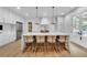 Contemporary kitchen featuring a marble island with seating and modern stainless-steel appliances at 2756 Octavia Ln, Marietta, GA 30062